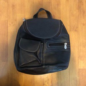 Small brown leather backpack